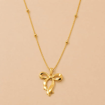 The Aria Bow Pendant Necklace