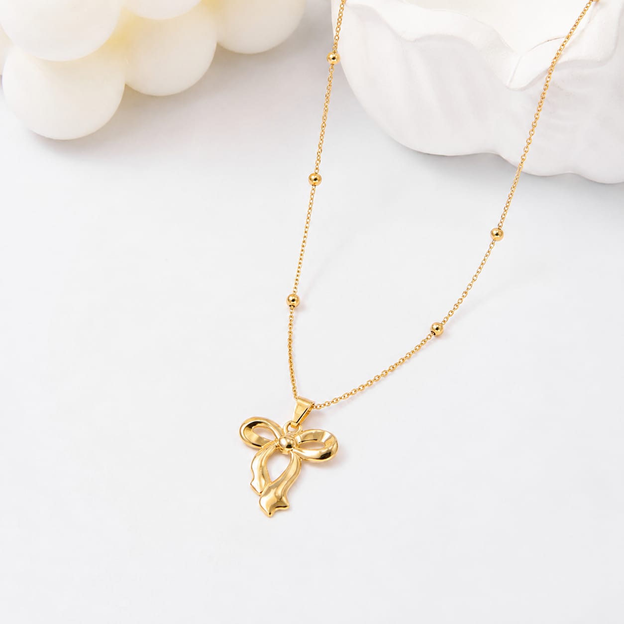 The Aria Bow Pendant Necklace