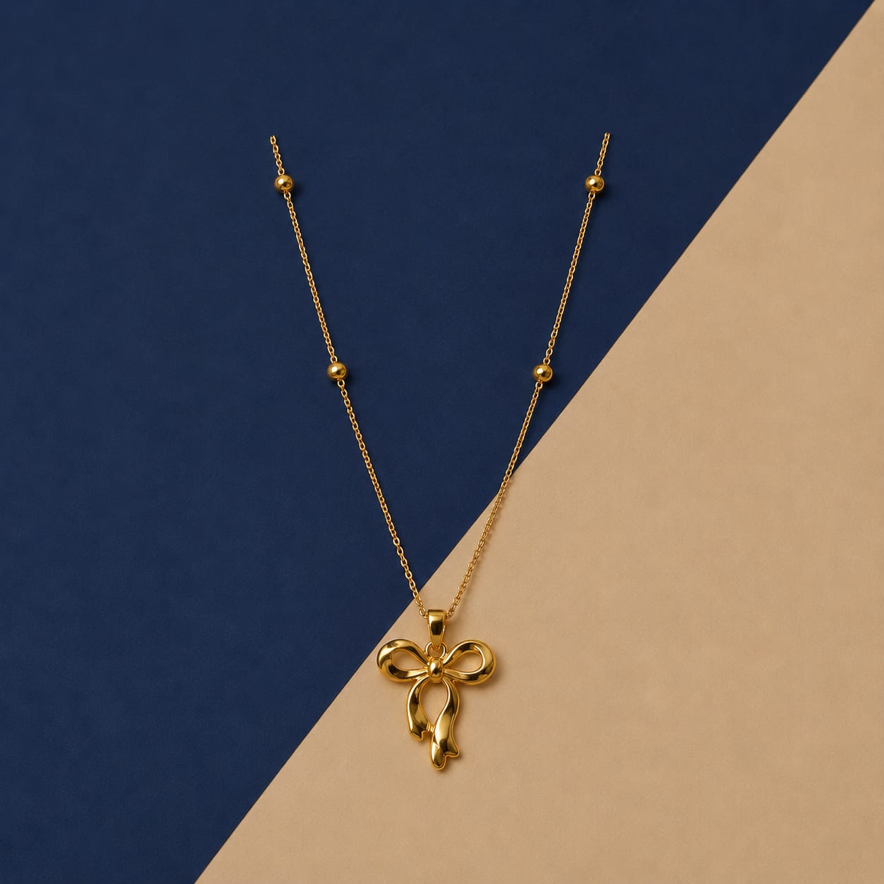 The Aria Bow Pendant Necklace